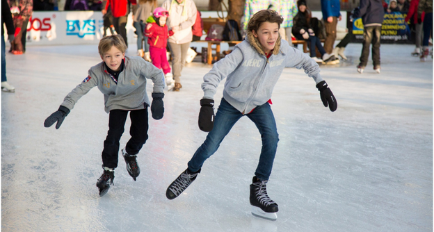 two children ice skating in Atlanta